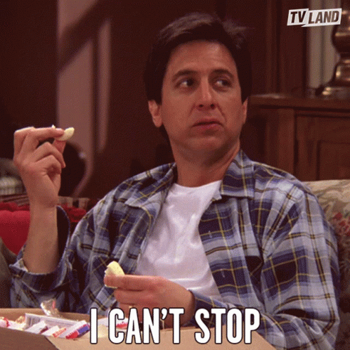 A Man In A Plaid Shirt Is Eating Chips And Says I Can T Stop GIF