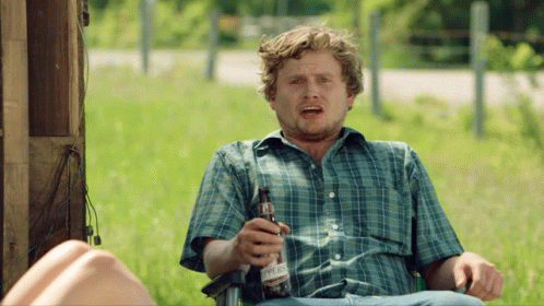 Man Holding Stout Bottle GIF