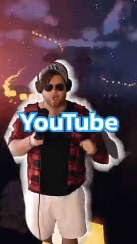 A Man In A Plaid Shirt Is Holding A Microphone And The Word Youtube Is On The Screen Behind Him GIF