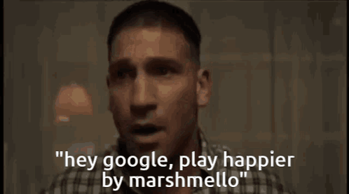 A Man In A Plaid Shirt Is Saying " Hey Google Play Happier By Marshmellow " GIF