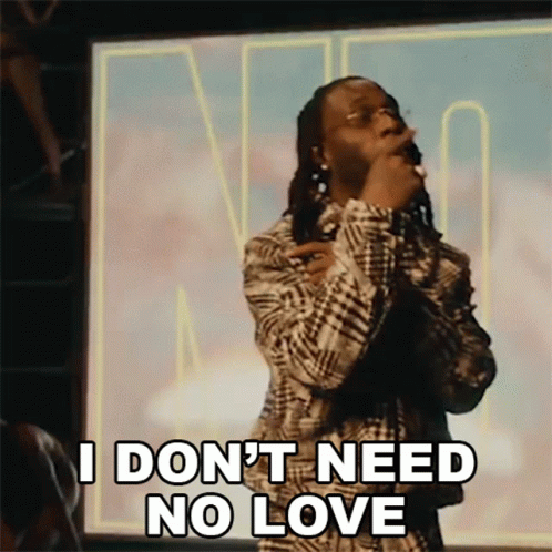 A Man In A Plaid Shirt Is Singing Into A Microphone And Says I Don 'T Need No Love GIF