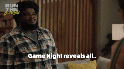 A Man In A Plaid Shirt Says Game Night Reveals All On A Screen GIF