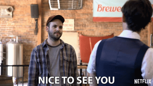 Man In Plaid Shirt Saying Nice To See You GIF