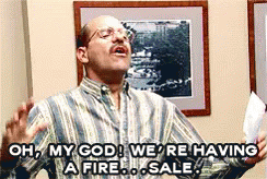 A Man In A Plaid Shirt Says Oh My God We Are Having A Fire Sale GIF
