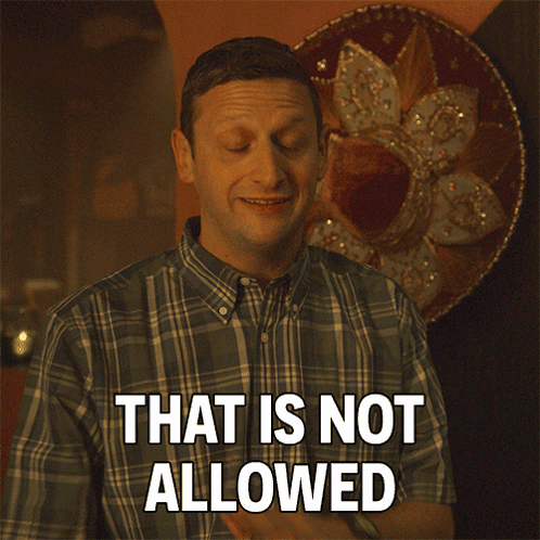 A Man In A Plaid Shirt Says That Is Not Allowed In White Letters GIF