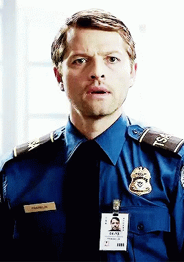 A Man In A Police Uniform Has A Name Tag That Says Franklin On It GIF