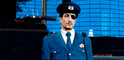 A Man In A Police Uniform Has A Patch On His Eye That Says ' A ' On It GIF