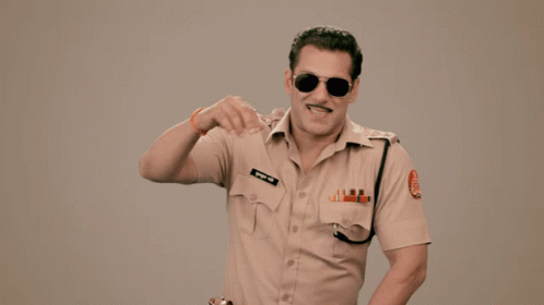 A Man In A Police Uniform Has The Word Lol Written On His Shirt GIF