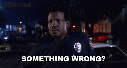 A Man In A Police Uniform Is Asking Something Wrong GIF