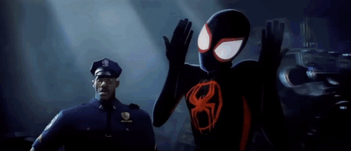 A Man In A Police Uniform Is Standing Next To A Spider Man In A Black Suit . GIF
