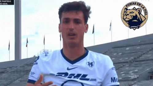A Man In A Pumas En La Luz Jersey GIF