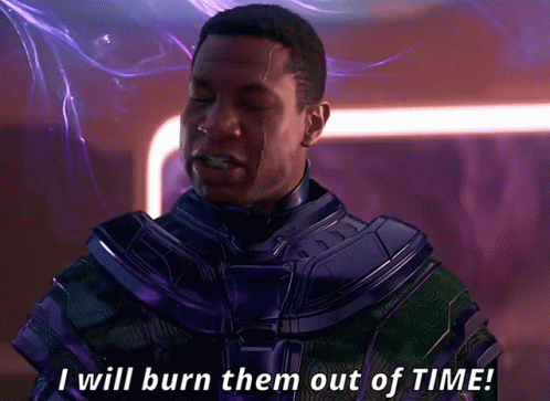 A Man In A Purple And Green Suit Says I Will Burn Them Out Of Time GIF