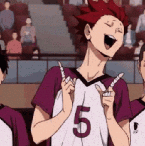 A Man In A Purple And White Jersey With The Number 5 On It Is Laughing And Giving A Thumbs Up . GIF