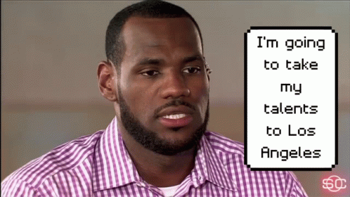 A Man In A Purple Plaid Shirt Is Talking About Going To Los Angeles GIF