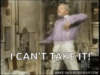 A Man In A Purple Shirt And Suspenders Is Dancing In A Room And Saying `` I Can 'T Take It ! '' GIF
