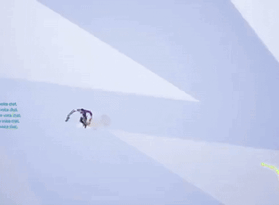A Man In A Purple Shirt Is Flying Through The Air GIF