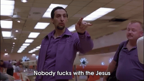 A Man In A Purple Shirt Says Nobody Fucks With Jesus GIF