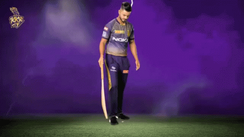 A Man In A Purple Shirt That Says Noki On It GIF