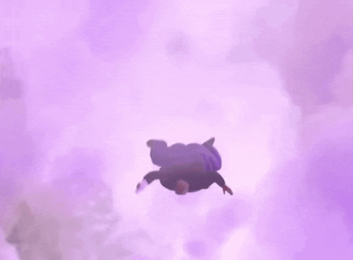 A Man In A Purple Shirt With The Letter A On It Is Jumping In The Air GIF