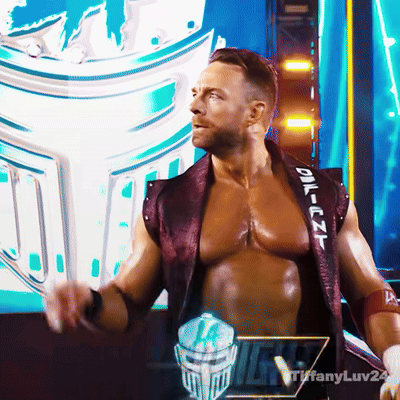 A Man In A Purple Vest With The Word Oil On The Sleeve GIF