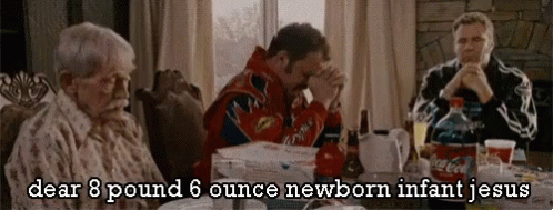 A Man In A Race Car Jacket Sits At A Table With Two Older Women And A Coca Cola Bottle GIF