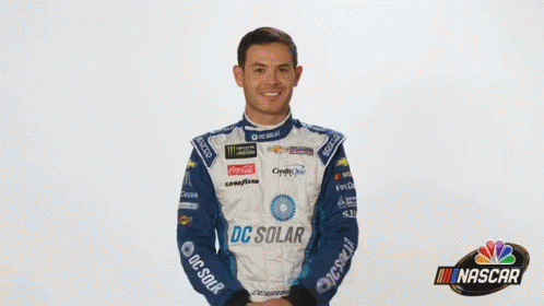 A Man In A Racing Suit With Dc Solar On It GIF