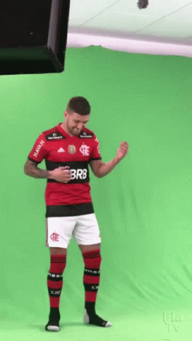 A Man In A Red And Black Jersey That Says Br8 On It GIF