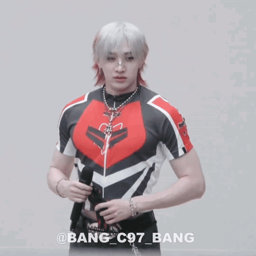 A Man In A Red And Black Shirt Has The Name Bang On The Bottom GIF