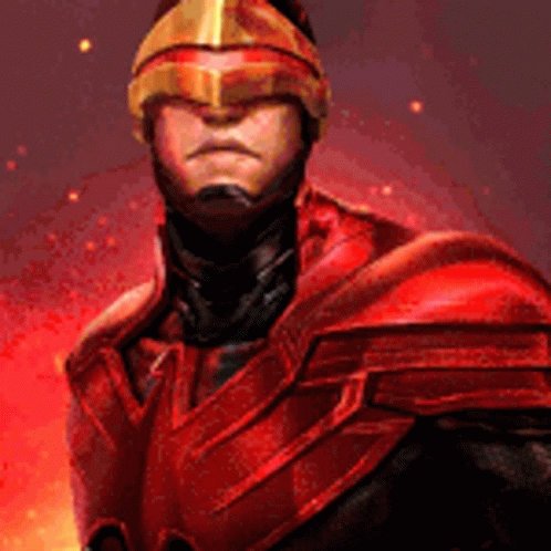 A Man In A Red Armor And Helmet Is Standing In Front Of A Fireball . GIF