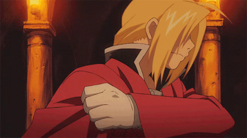 A Man In A Red Cape With A White Glove On GIF