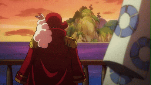 A Man In A Red Coat Stands On A Balcony Overlooking A Body Of Water GIF