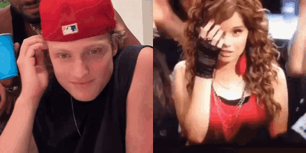 A Man In A Red Hat And A Woman In A Red Shirt GIF