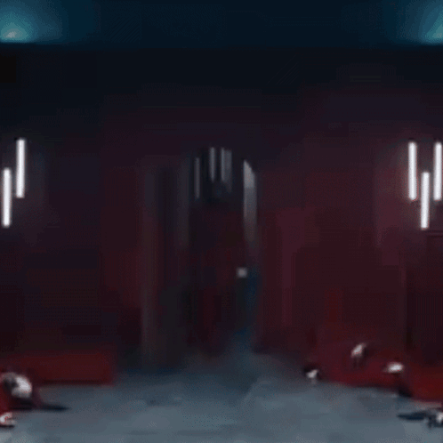 A Man In A Red Hoodie Is Kissing Another Man GIF