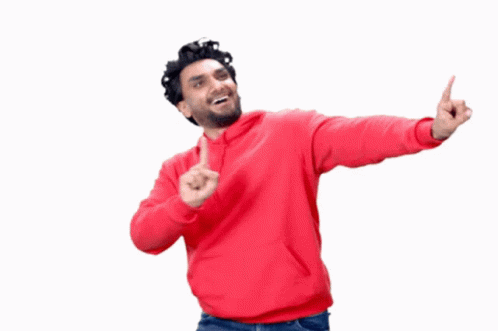 A Man In A Red Hoodie Is Pointing Up With His Fingers GIF