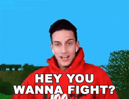 A Man In A Red Hoodie Says " Hey You Wanna Fight ? " GIF