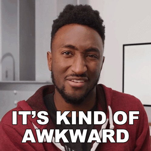 A Man In A Red Hoodie Says " It 'S Kind Of Awkward " In White Letters GIF