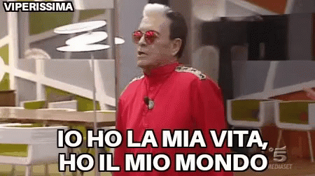A Man In A Red Jacket And Sunglasses Says Io Ho La Mia Vita Ho Il Mio Mondo . GIF