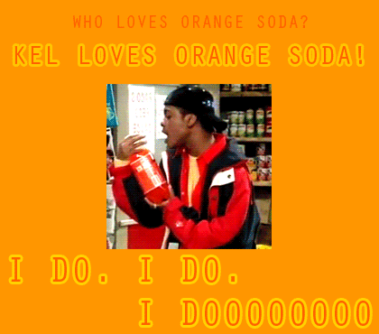 A Man In A Red Jacket Drinking Orange Soda GIF