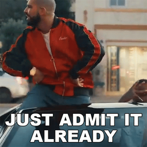 A Man In A Red Jacket Is Dancing In A Car With The Words Just Admit It Already Written On The Bottom GIF
