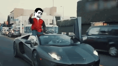 A Man In A Red Jacket Is Driving A Sports Car With The Door Open GIF