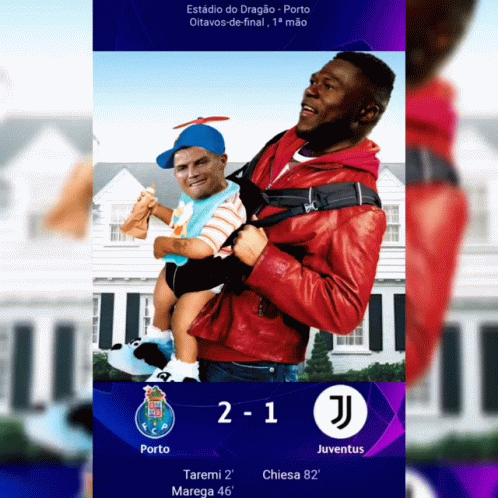 A Man In A Red Jacket Is Holding A Baby In Front Of A House And The Score Is 2-1 GIF