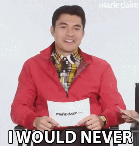 A Man In A Red Jacket Is Holding A Piece Of Paper And Saying `` I Would Never '' While Sitting Down . GIF