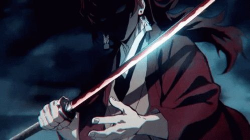 A Man In A Red Jacket Is Holding A Sword In His Hands . GIF