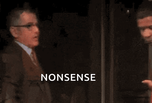 A Man In A Red Jacket Is Pointing At Another Man In A Suit While The Word Nonsense Is Displayed In The Background GIF