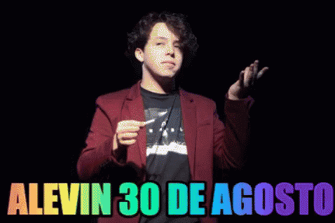 A Man In A Red Jacket Lighting A Match With The Words Alevin 30 De Agosto Written Below Him GIF