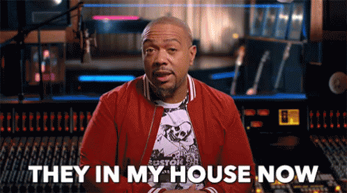 A Man In A Red Jacket Says They In My House Now . GIF