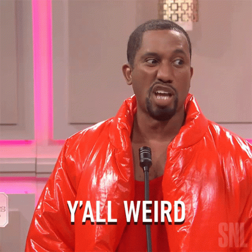 A Man In A Red Jacket Says Y'all Weird In Front Of A Microphone GIF