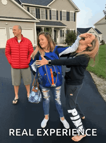 A Man In A Red Jacket Stands Behind Two Girls With The Words Real Experience Written Below Them GIF
