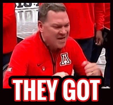 a man in a red jacket with the letter a on it