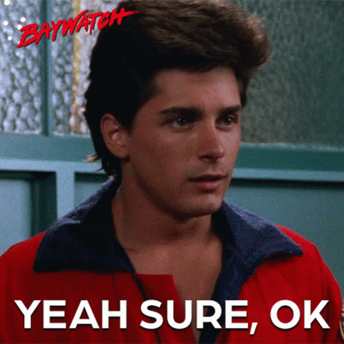 A Man In A Red Jacket With The Words Yeah Sure Ok Below Him GIF